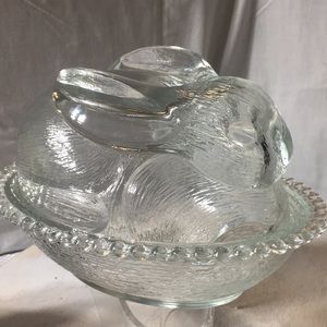 Vintage pressed clear glass bunny lid on basket dish.